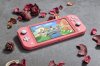 Игровая приставка Nintendo Switch Lite Кораллово-Розовая + игра Animal Crossing: New Horizons Русская версия + NSO (3 месяца индивидуального членства)